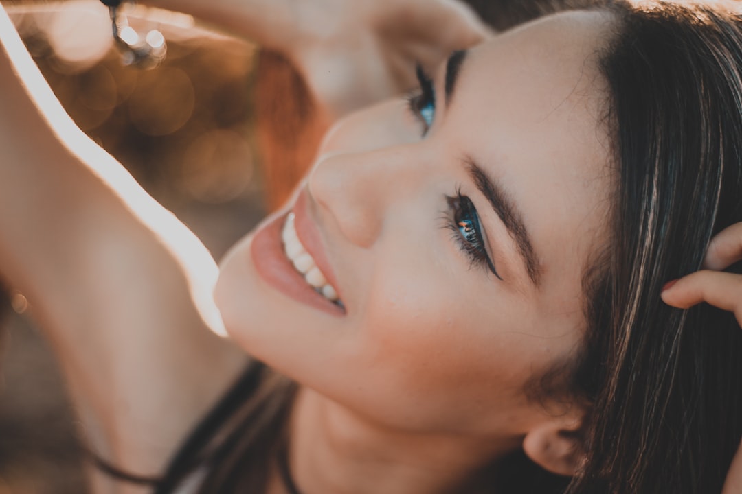 Smiling with hands in hair